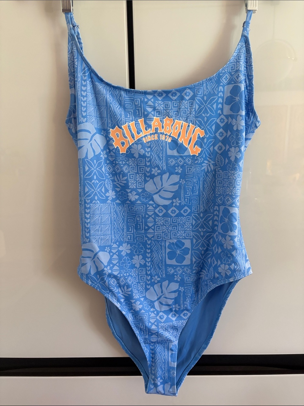 Billabong Blue Floral Print Woman’s One-Piece Swimsuit with Orange Logo